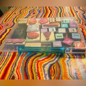 Rubbers stamps with ink pads and carrying case.